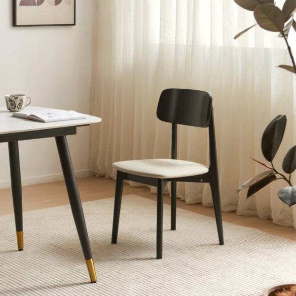 Andover Minimalist Black Dining Chair with Curved Backrest and Solid Wood Legs