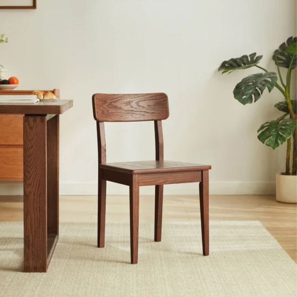 Edele Walnut Color Solid Timber Dining Chair with Subtle Curved Backrest